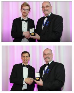 Essay prize winners receive their medals